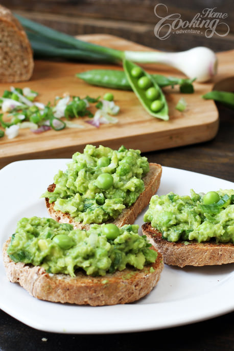 avocado and pea salad on freshly baked bread