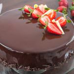 Strawberry Chocolate Mirror Cake topped with Strawberries