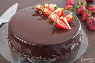 Strawberry Chocolate Mirror Cake topped with Strawberries