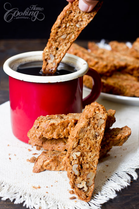 Apples and Oats Biscotti dipping in coffee