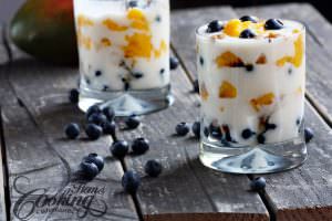 serving closeup on a rustic table with blueberry in the background 