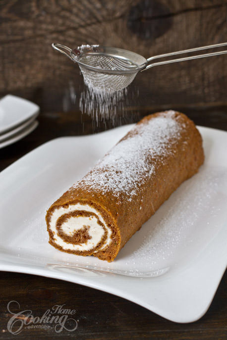 Carrot Cake Roll with powdered sugar dusting 
