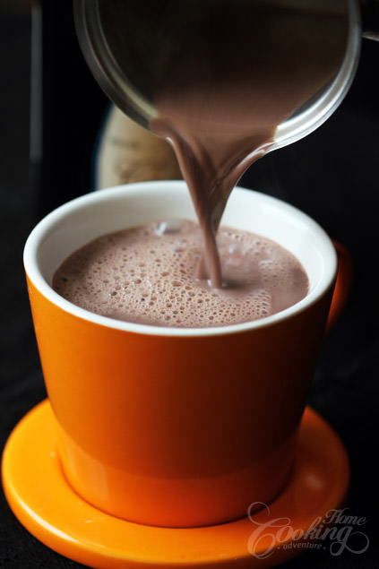 Hot Chocolate with Red Wine pouring in a cup