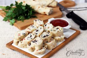 Tortilla Pinwheels with tomato sauce on display