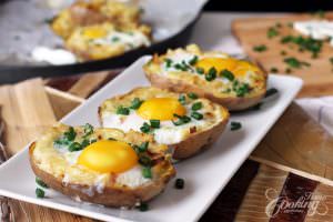 potatoes with Eggs and onions displayed on a plate 