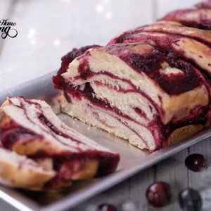 cranberry orange babka cut into slices