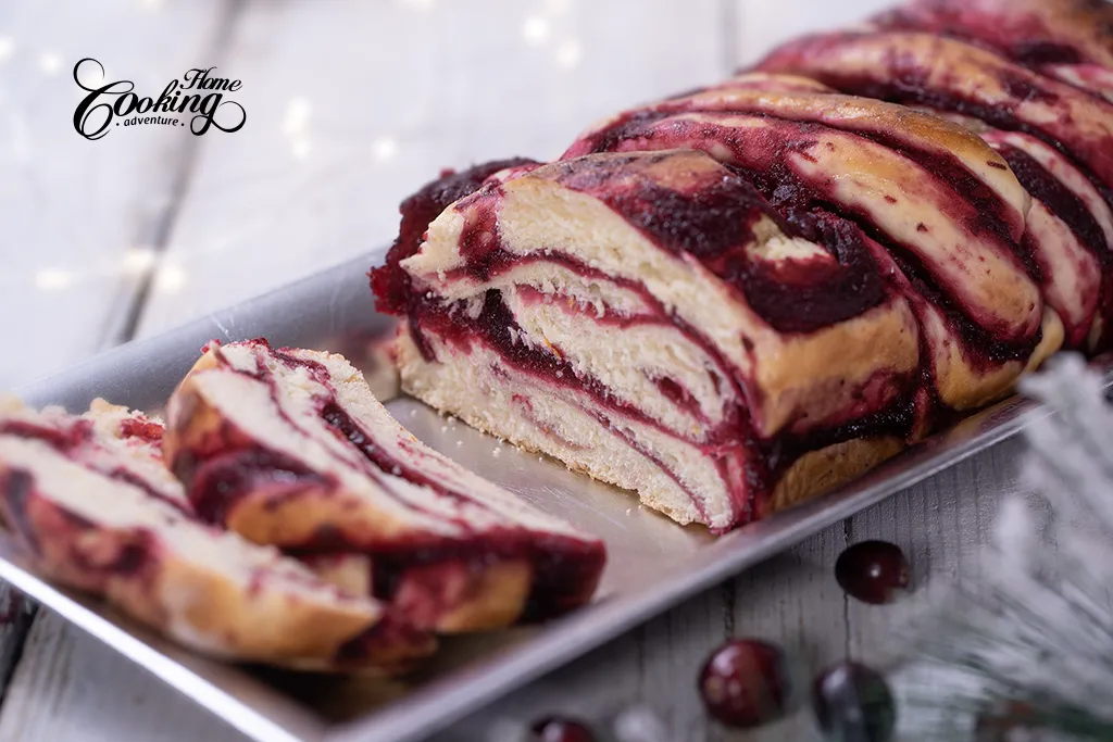 cranberry orange babka cut into slices