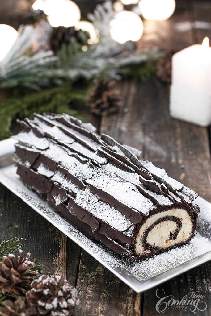 chocolate coconut buche de noel with chocolate shards 