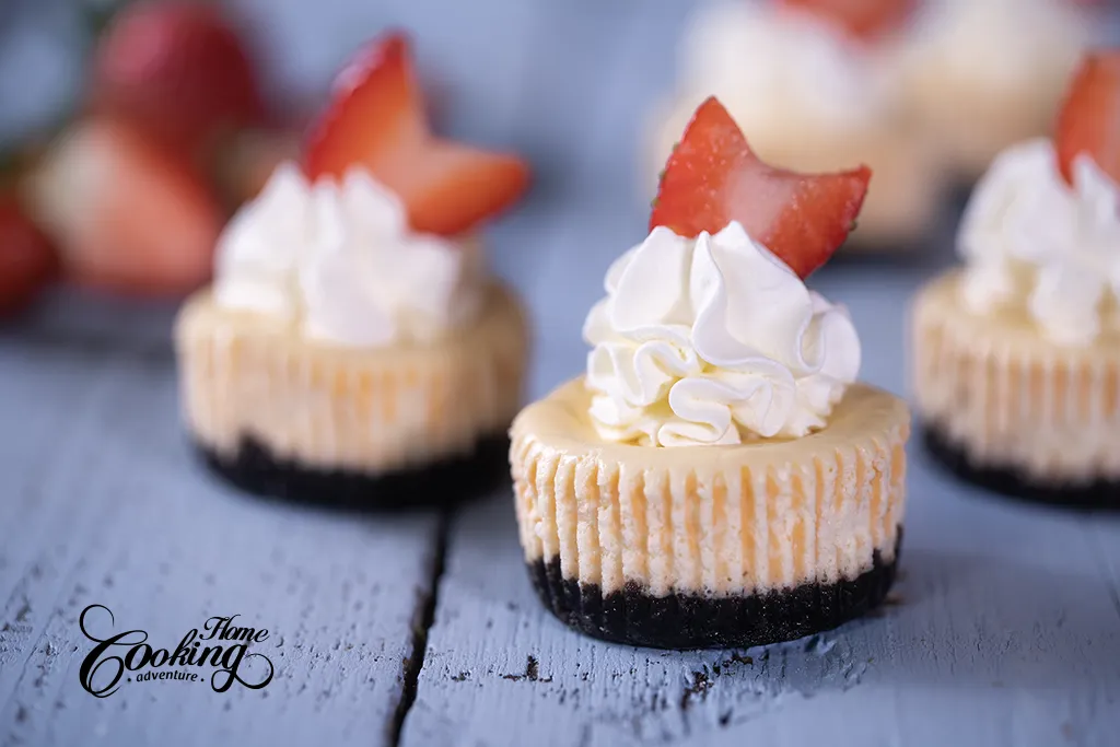 Mini Cheesecakes with Oreo Crust and whipped cream topping