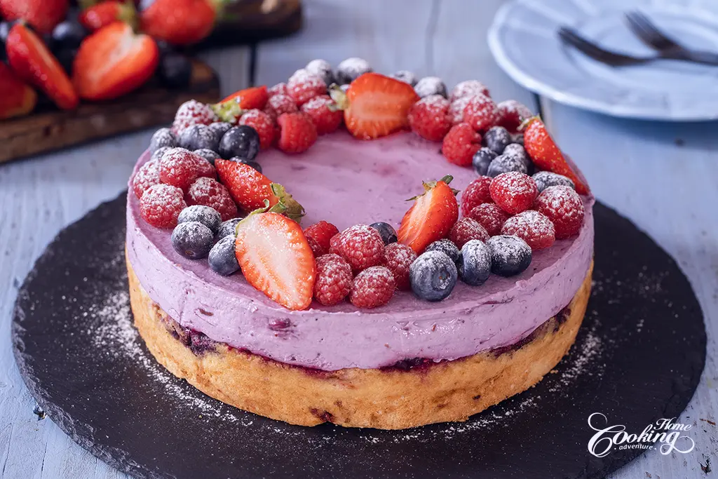 Berry Cream Cheese Mousse Cake - decorated with fresh mixed berries