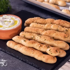 homemade breadsticks with olive oil, garlic and herbs