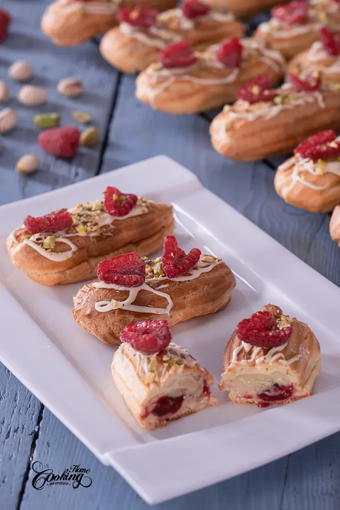 Pistachio Raspberry Mini Eclairs  - filled with pistachio pastry cream and homemade raspberry jam