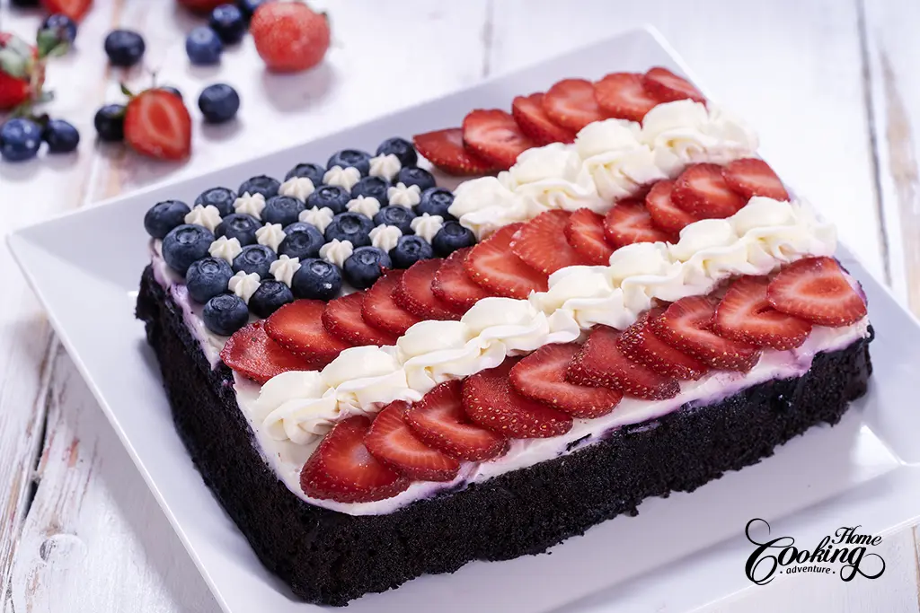American Flag Cake - chocolate cake decorated with berries and cream cheese frosting