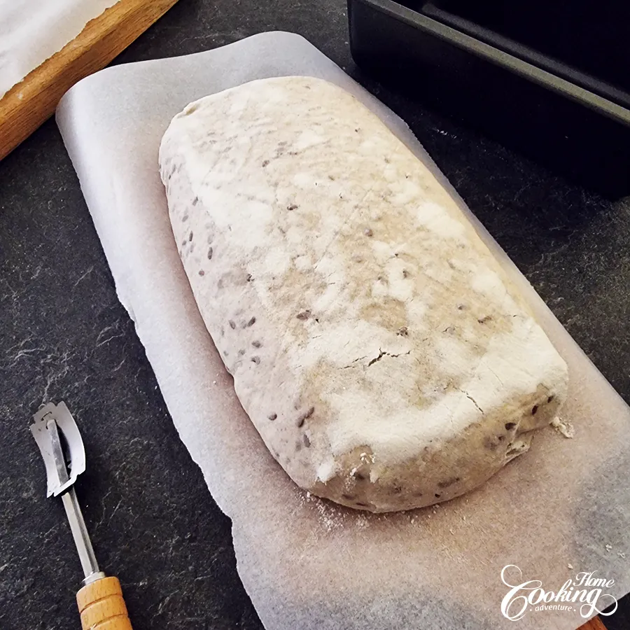 invert bread loaf onto a parchment paper