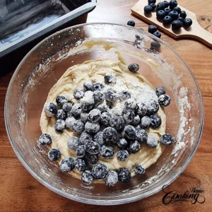 Add blueberries to the cake batter